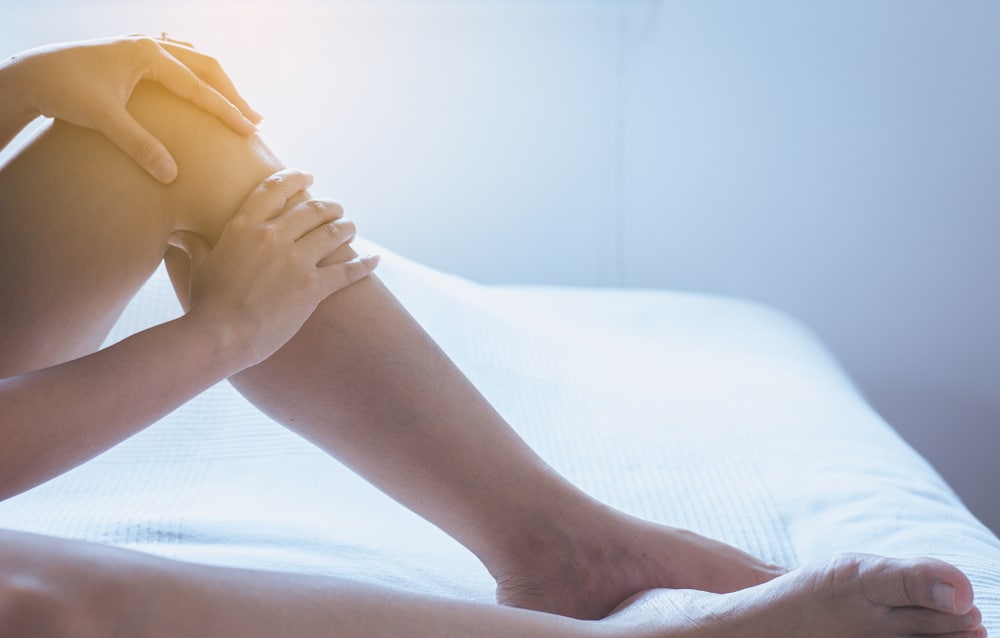 Woman with healthy legs after venous ulcer treatment in Geneva, IL